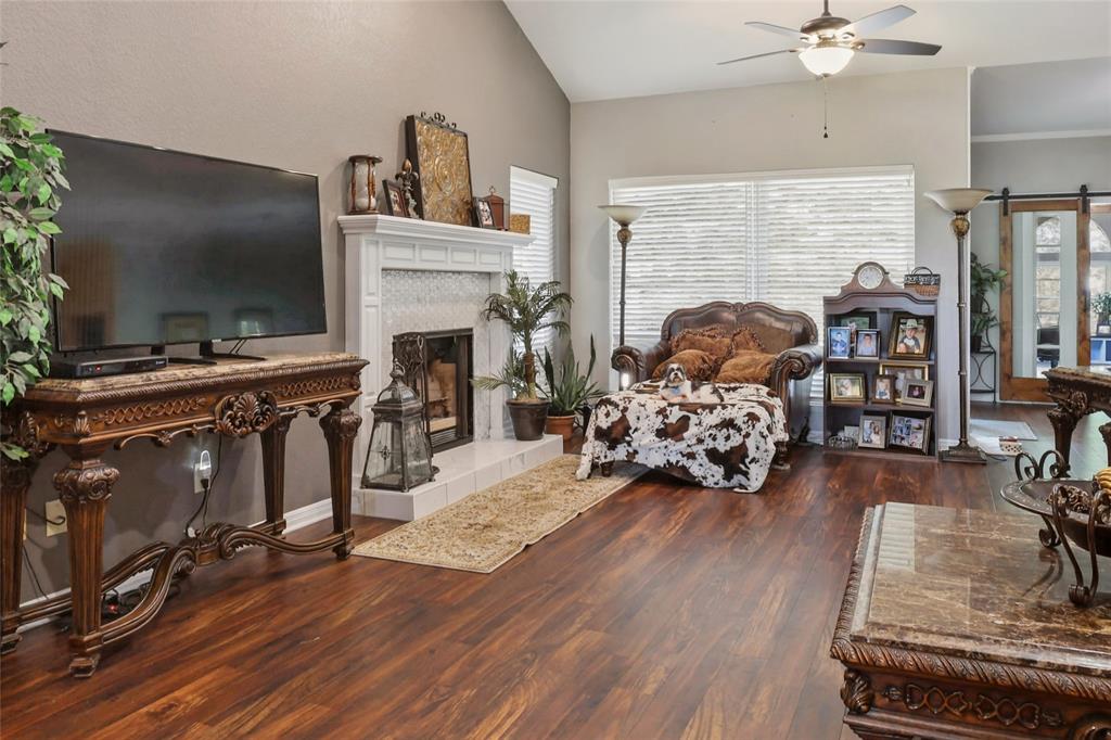 613 Regina Drive Hewitt, TX 76643 - Photo 21 of 33 a living room with furniture and a flat screen tv
