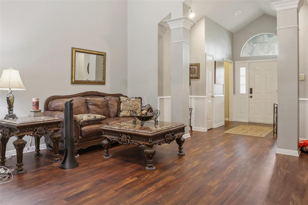 613 Regina Drive Hewitt, TX 76643 - Photo 22 of 33 a living room with furniture and wooden floor