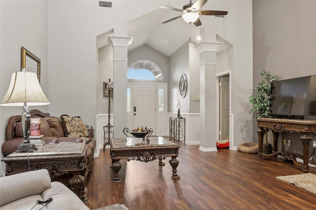 613 Regina Drive Hewitt, TX 76643 - Photo 24 of 33 a living room with furniture and a flat screen tv