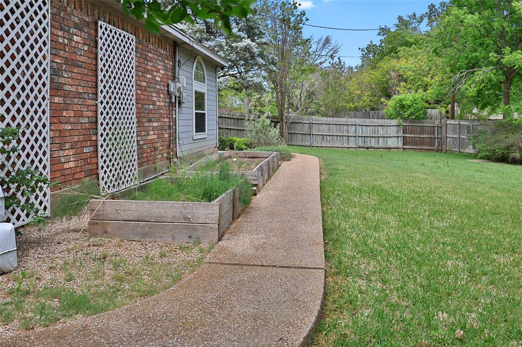 613 Regina Drive Hewitt, TX 76643 - Photo 7 of 33 a view of a house with a backyard