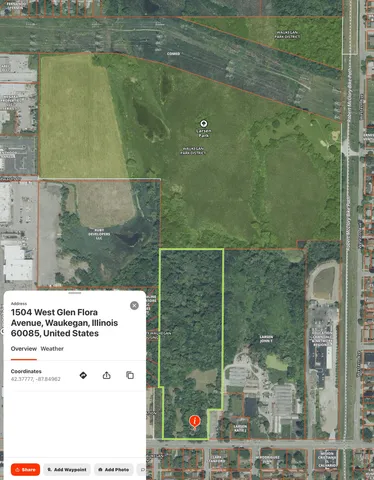 a picture of a bathroom with a shower and a sink