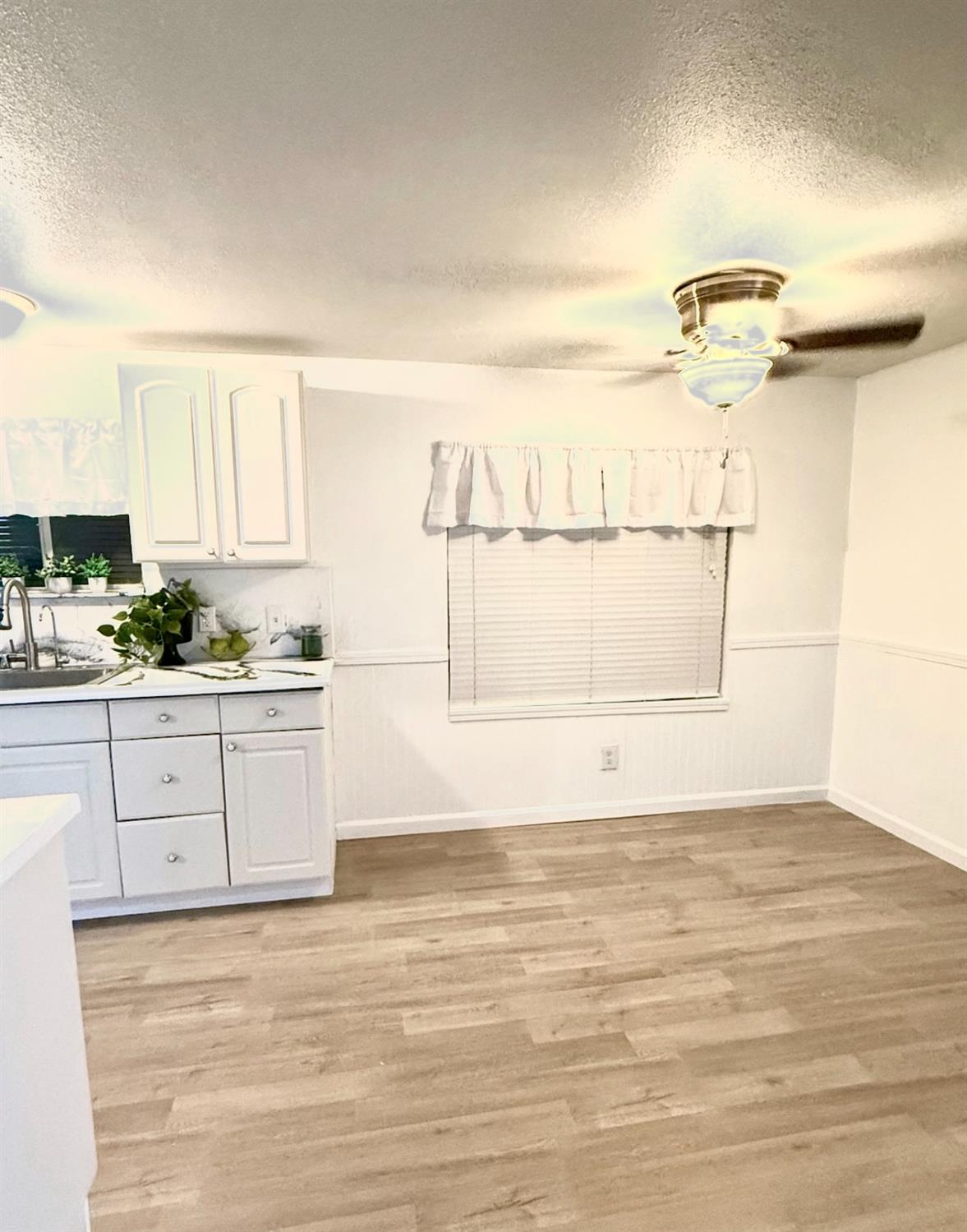 812 West Clover Road, Unit 66 Tracy, CA 95376 - Photo 11 of 27 Dining area off the kitchen with new ceiling fan