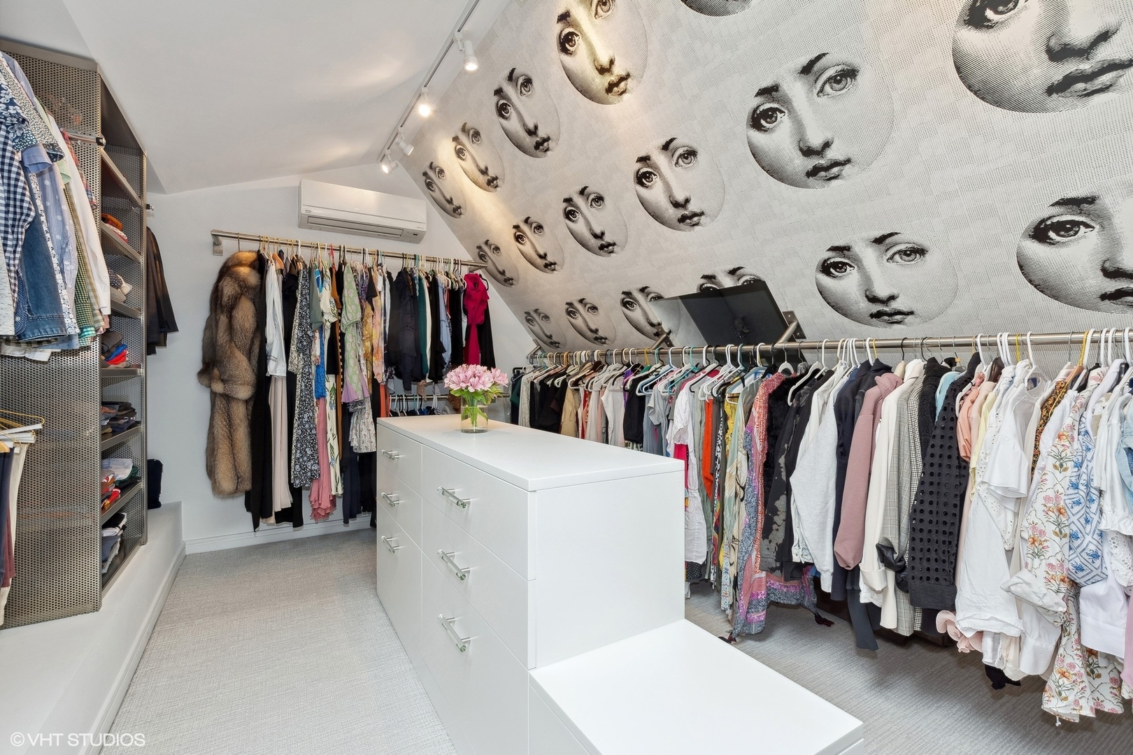 55 West Goethe Street, Unit 1223 Chicago, IL 60610 - Photo 19 of 31 a view of walk in closet with clothes and shoes