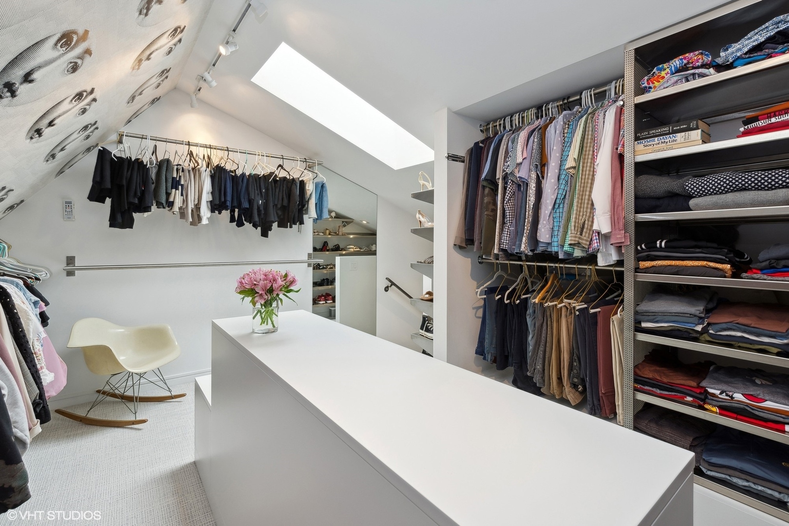 55 West Goethe Street, Unit 1223 Chicago, IL 60610 - Photo 20 of 31 a view of walk in closet with clothes and shoes