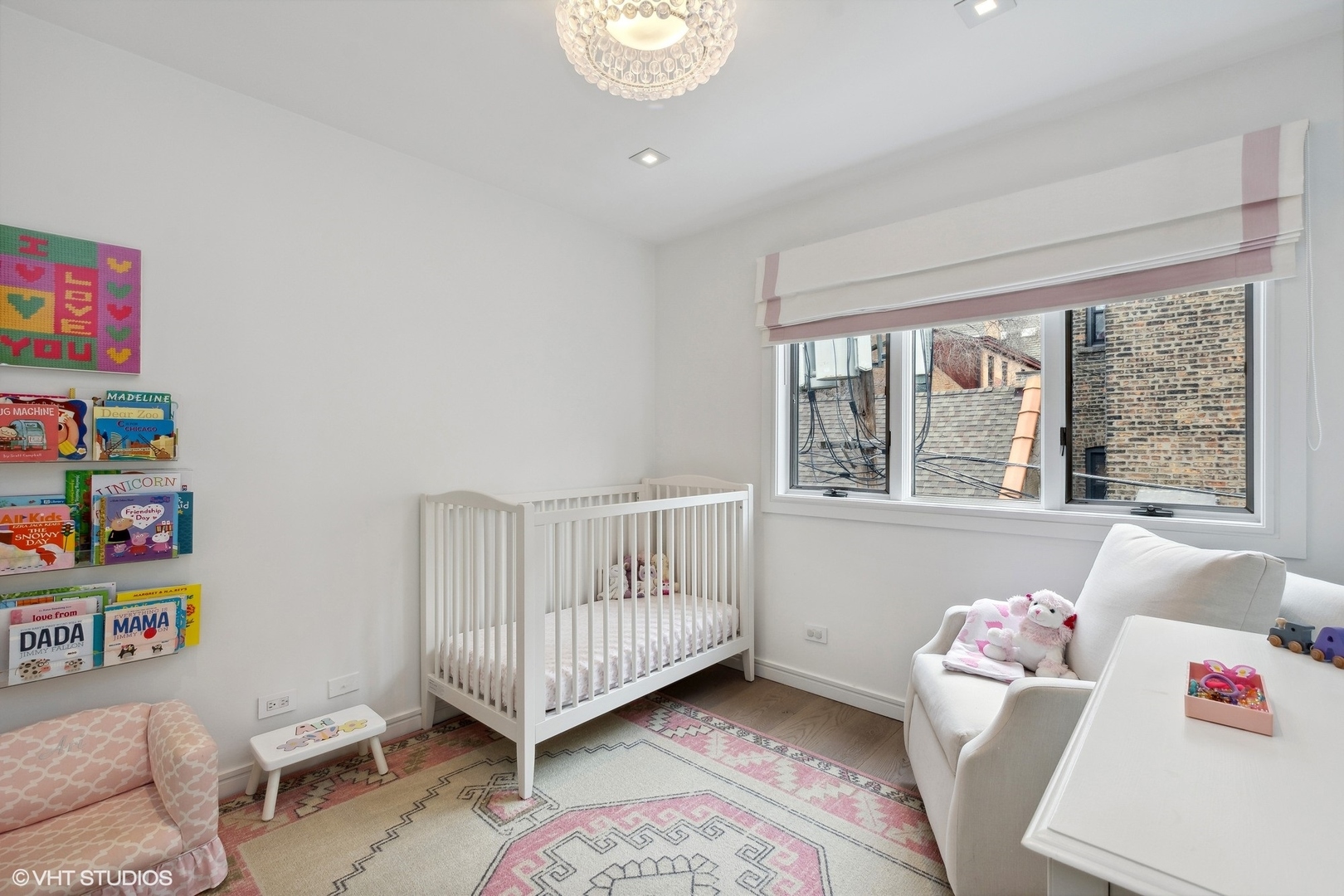 55 West Goethe Street, Unit 1223 Chicago, IL 60610 - Photo 22 of 31 a bedroom with furniture and a window