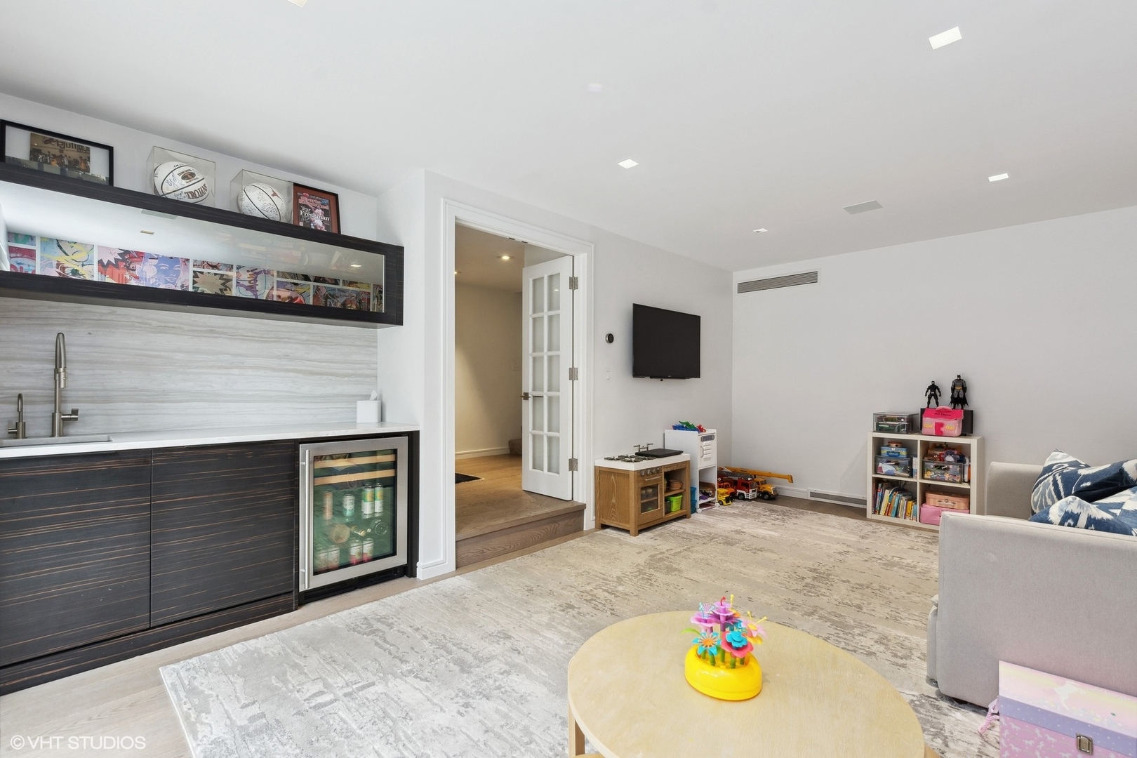 55 West Goethe Street, Unit 1223 Chicago, IL 60610 - Photo 25 of 31 a living room with furniture and a fireplace