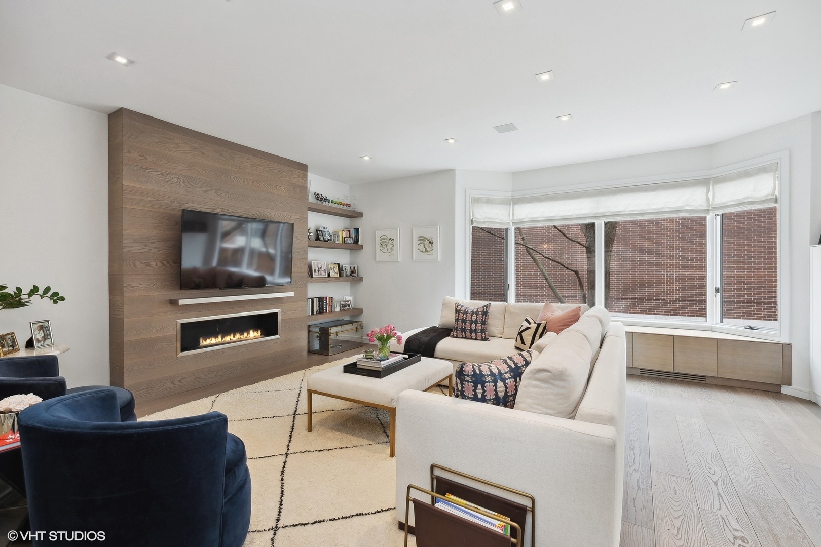 55 West Goethe Street, Unit 1223 Chicago, IL 60610 - Photo 3 of 31 a living room with furniture and a flat screen tv