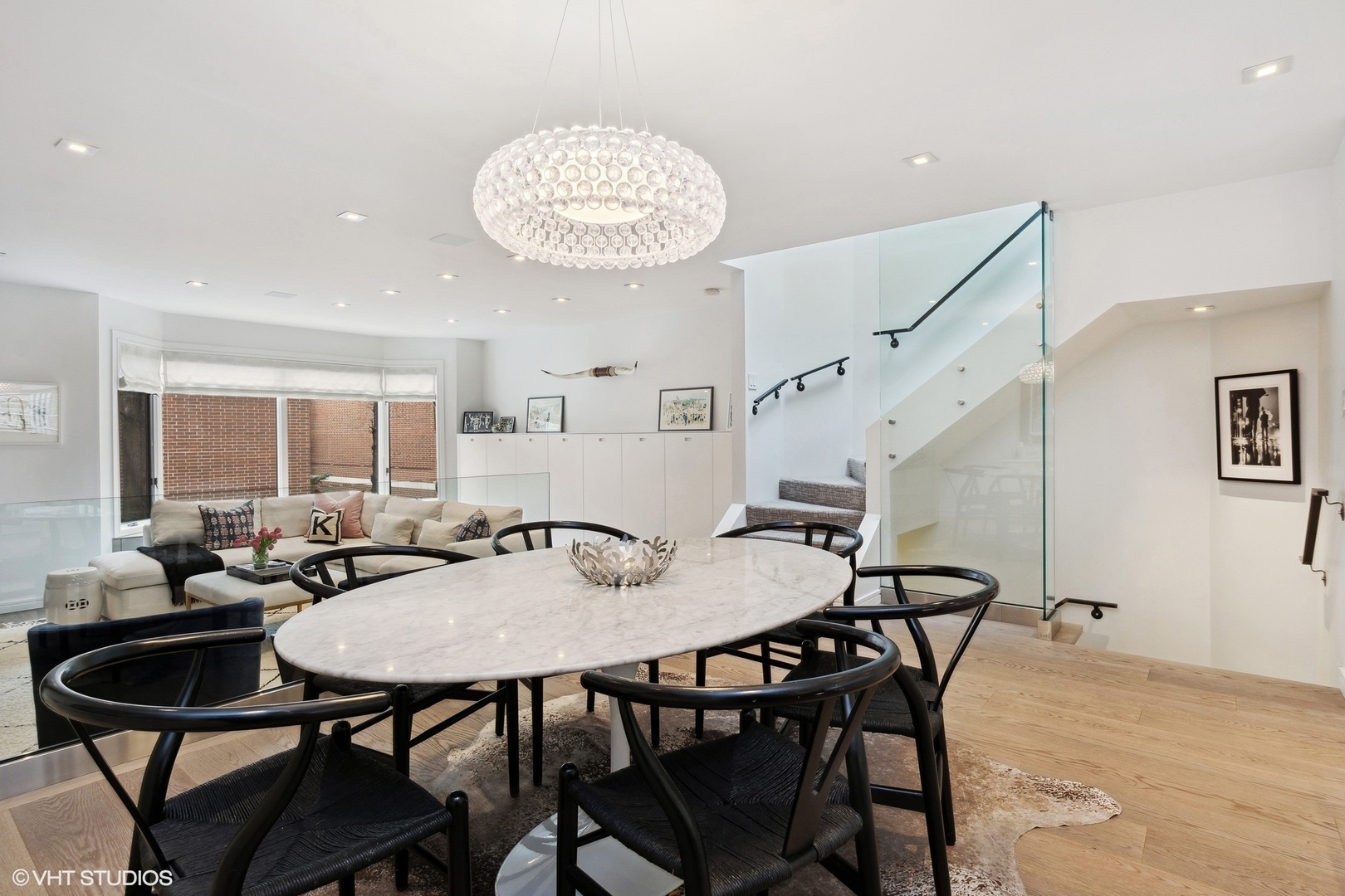 55 West Goethe Street, Unit 1223 Chicago, IL 60610 - Photo 8 of 31 a view of a dining room with furniture