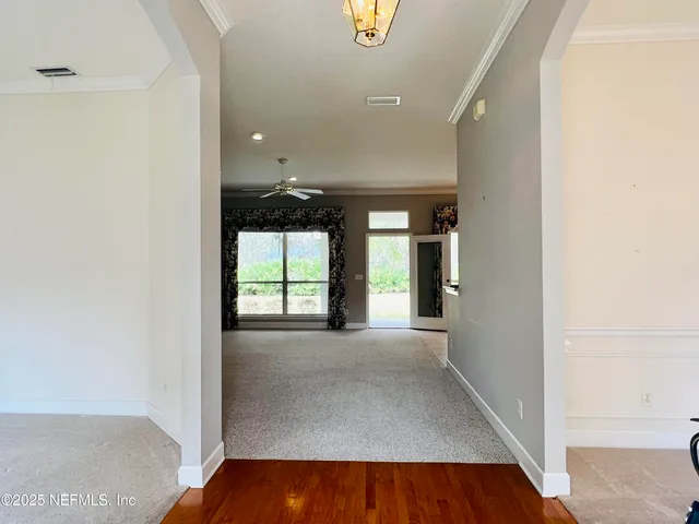 a kitchen with stainless steel appliances wooden cabinets a sink and a granite counter tops