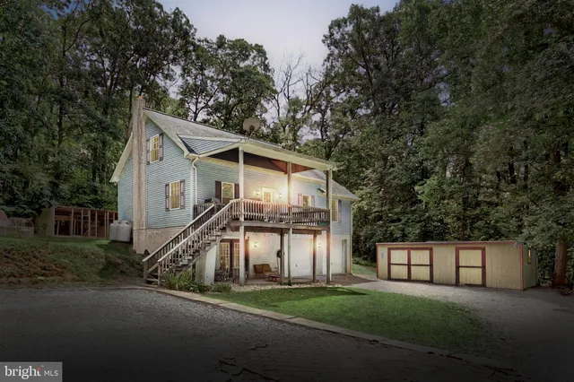 a view of a house with a street