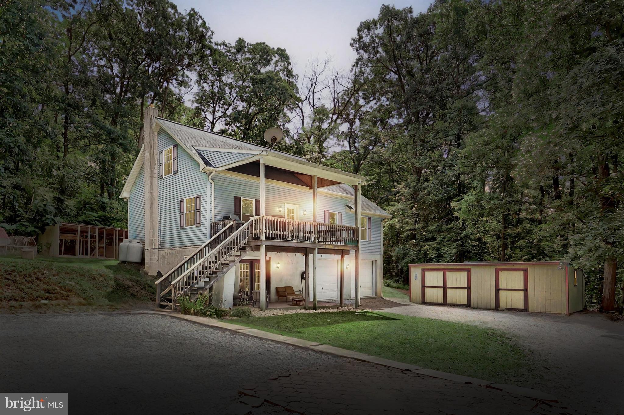 a view of a house with a street