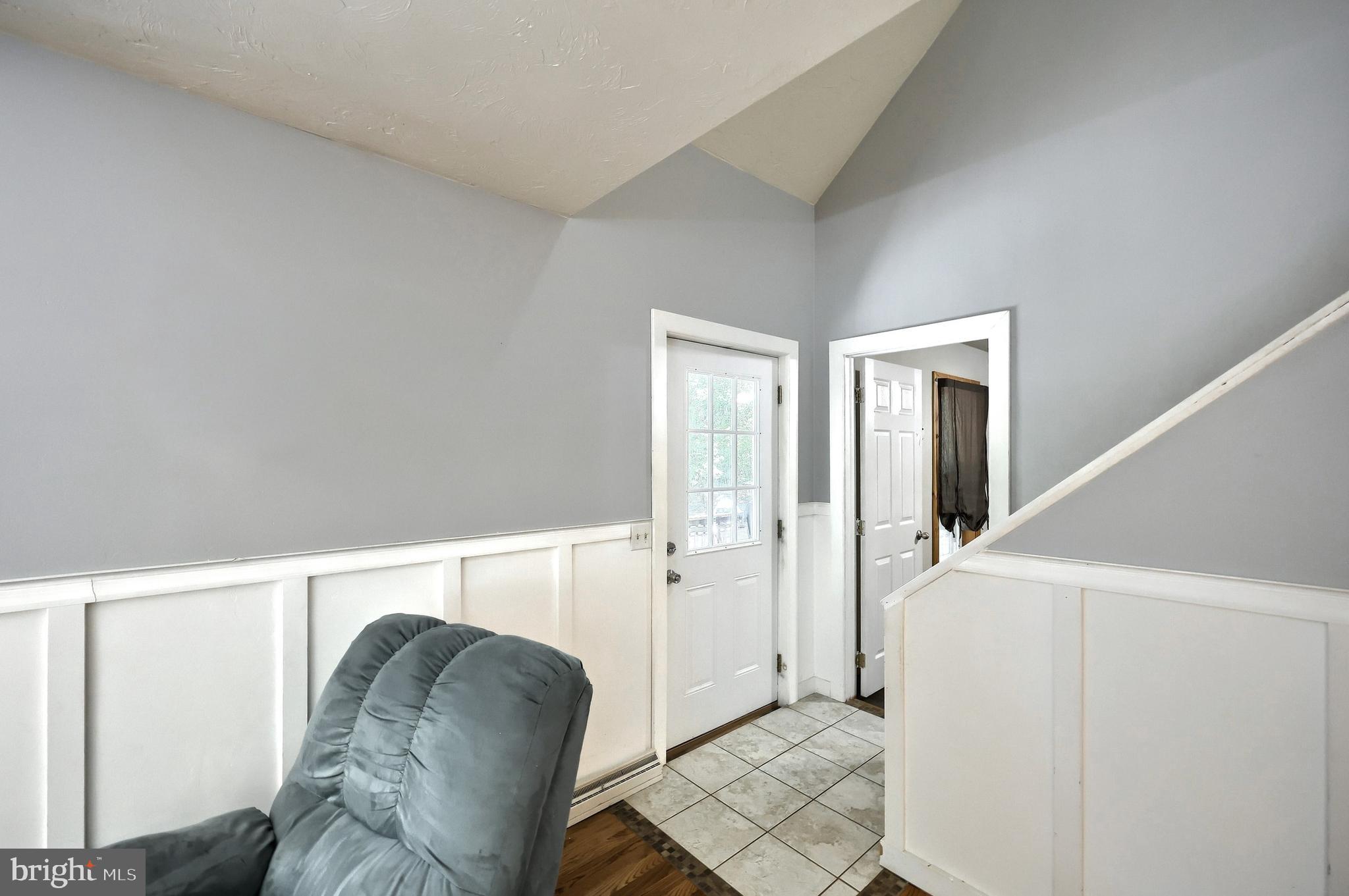 6031 Mountain Road Dover, PA 17315 - Photo 20 of 47 a living room with furniture and a hallway
