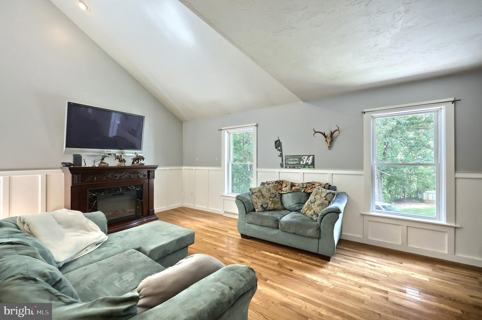 6031 Mountain Road Dover, PA 17315 - Photo 22 of 47 a living room with furniture and a flat screen tv