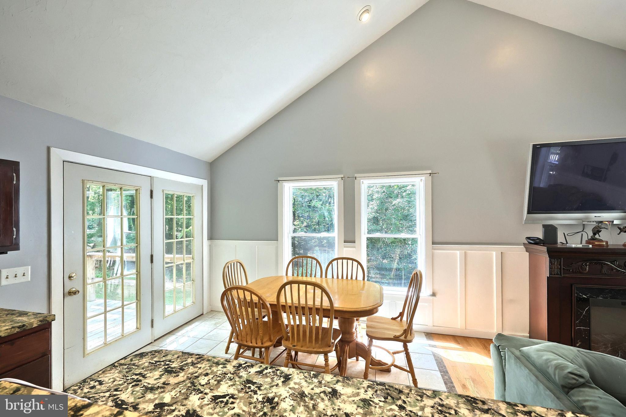 6031 Mountain Road Dover, PA 17315 - Photo 24 of 47 a view of a dining room with furniture window and outside view