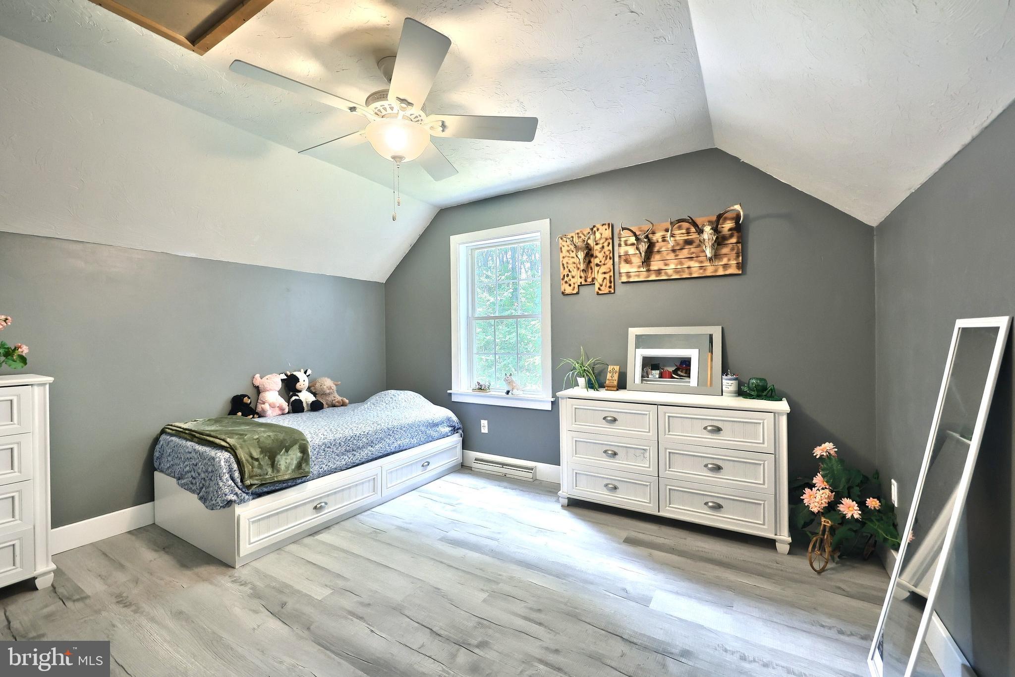 6031 Mountain Road Dover, PA 17315 - Photo 33 of 47 a living room with furniture and a flat screen tv