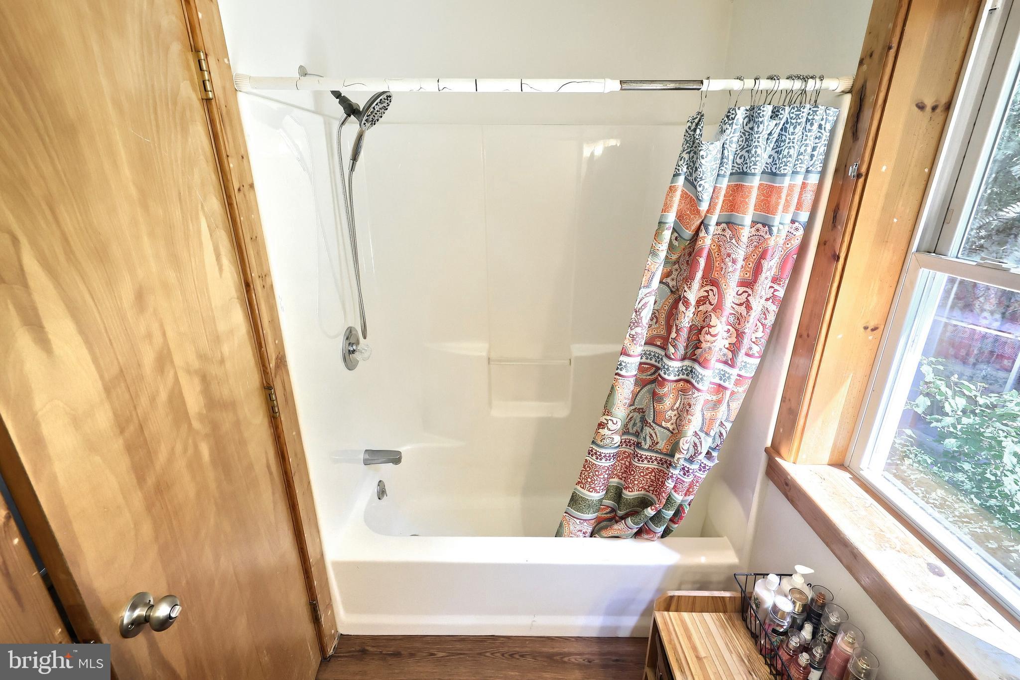 6031 Mountain Road Dover, PA 17315 - Photo 35 of 47 a bathroom with a bathtub and shower