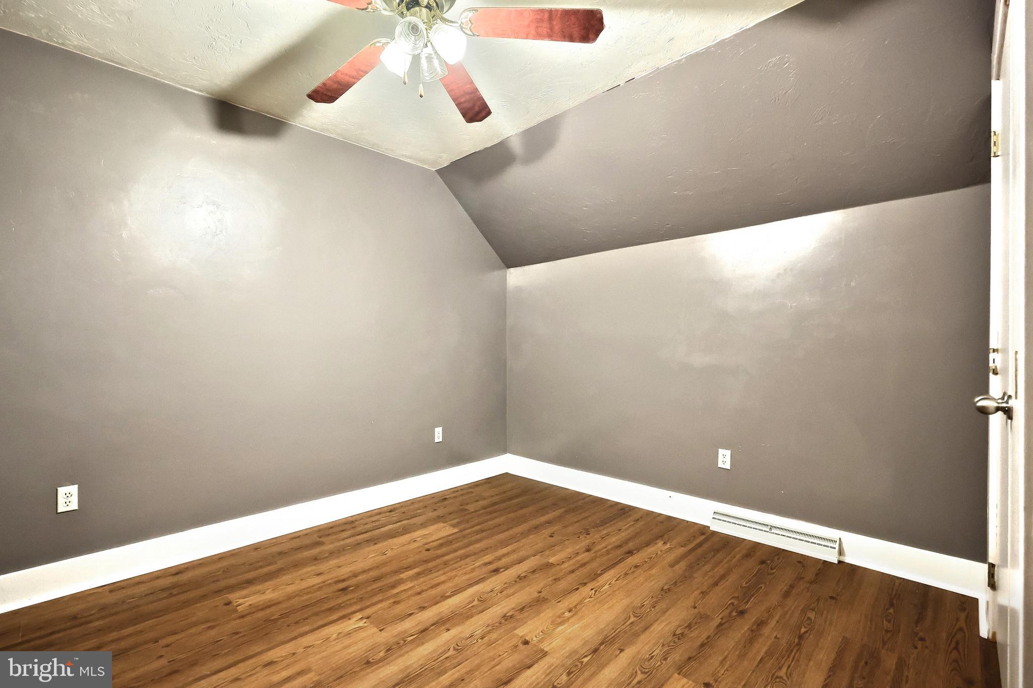 6031 Mountain Road Dover, PA 17315 - Photo 36 of 47 a view of an empty room with wooden floor