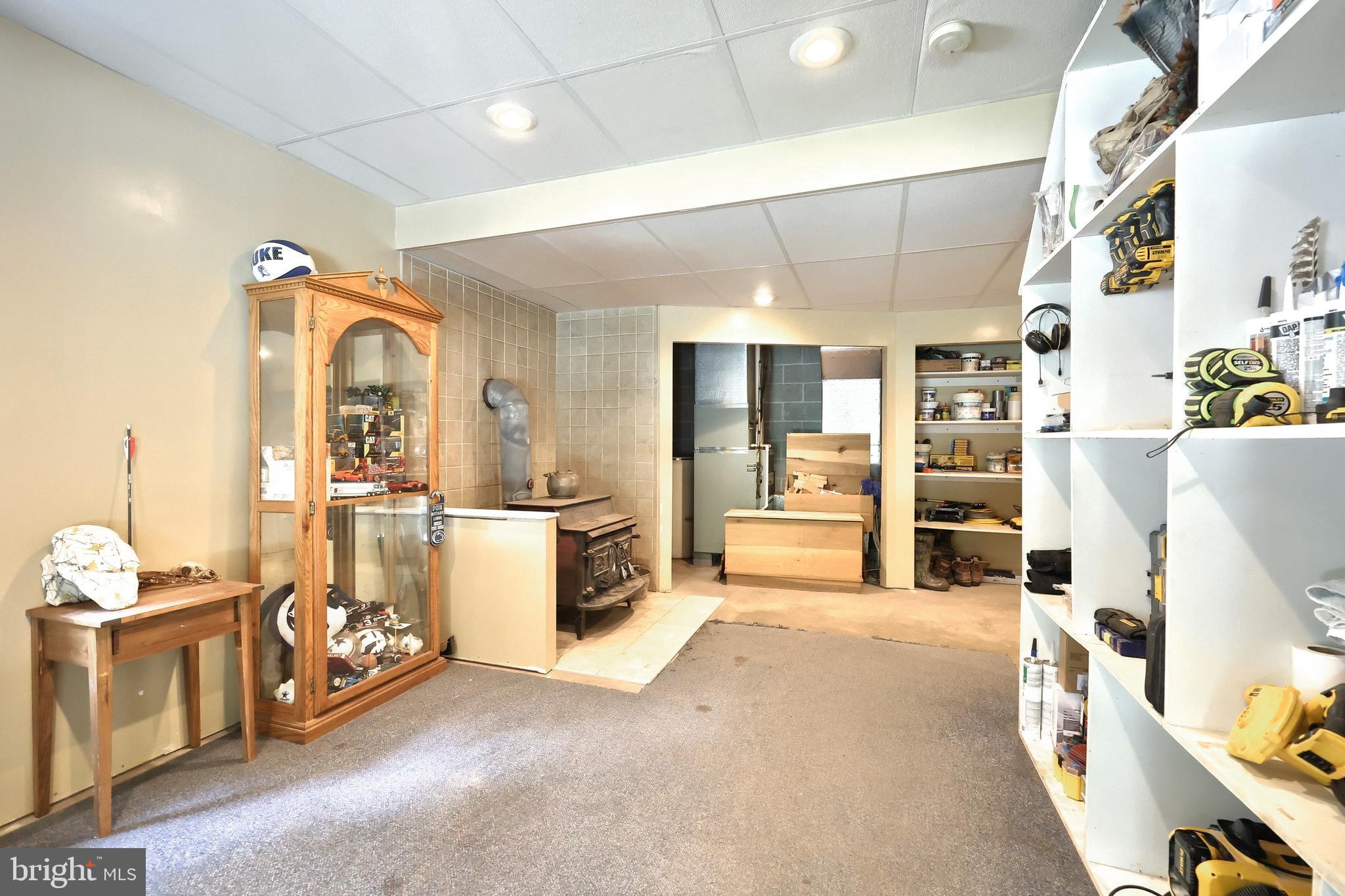 6031 Mountain Road Dover, PA 17315 - Photo 37 of 47 a spacious bedroom with a bed and a cabinets