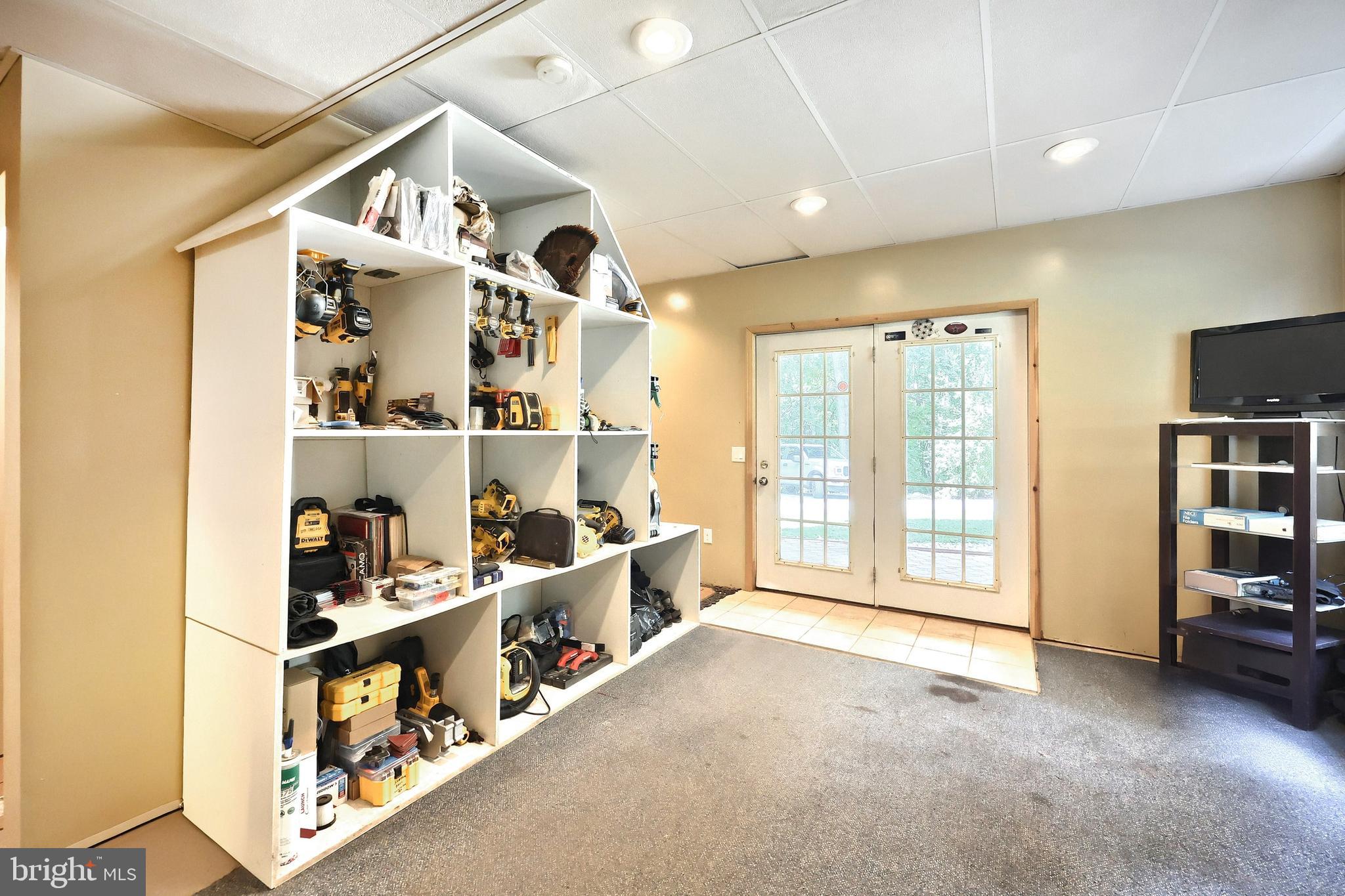 6031 Mountain Road Dover, PA 17315 - Photo 39 of 47 a big room with lots of shelves