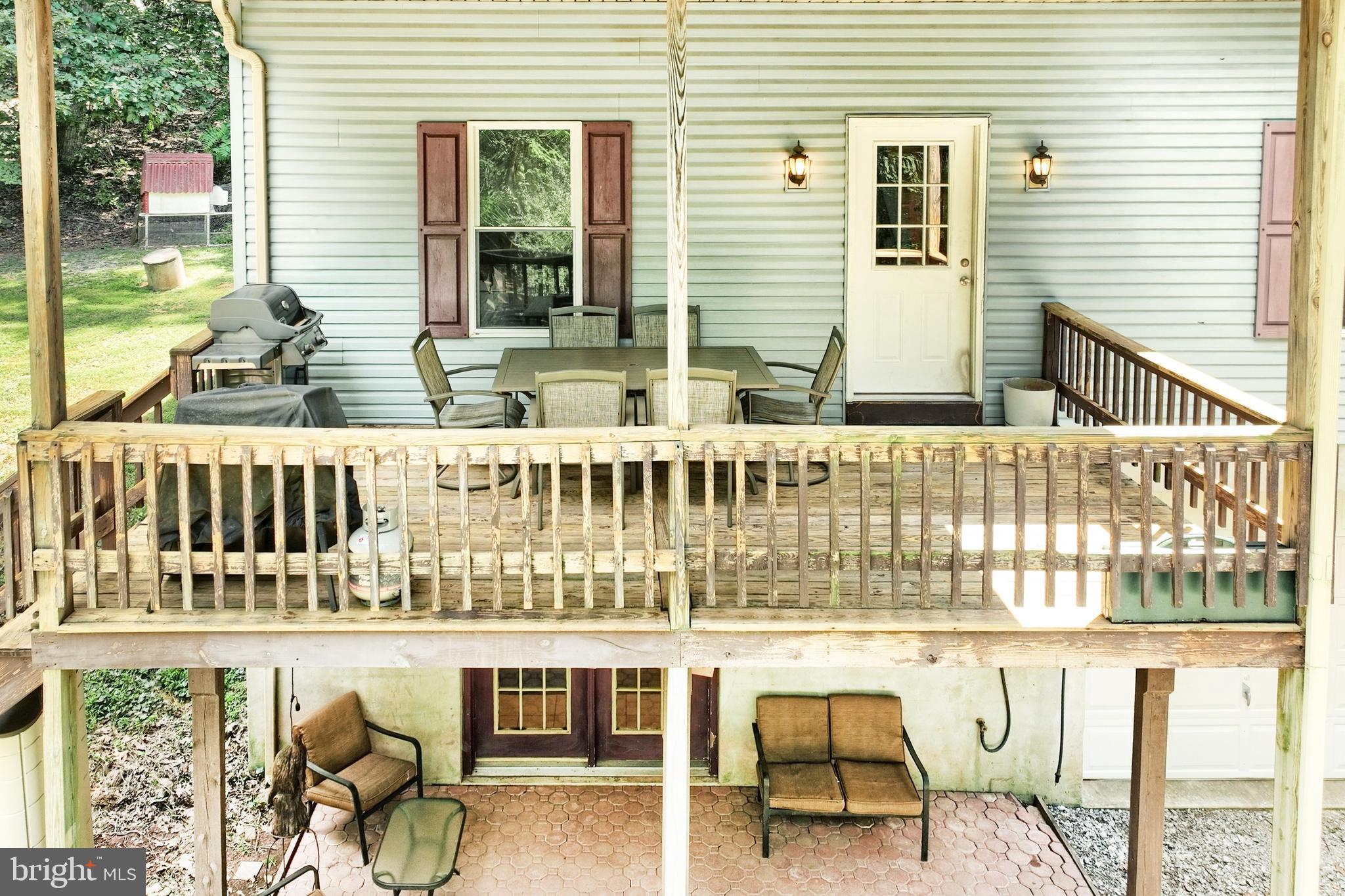 6031 Mountain Road Dover, PA 17315 - Photo 5 of 47 a balcony with table and chairs