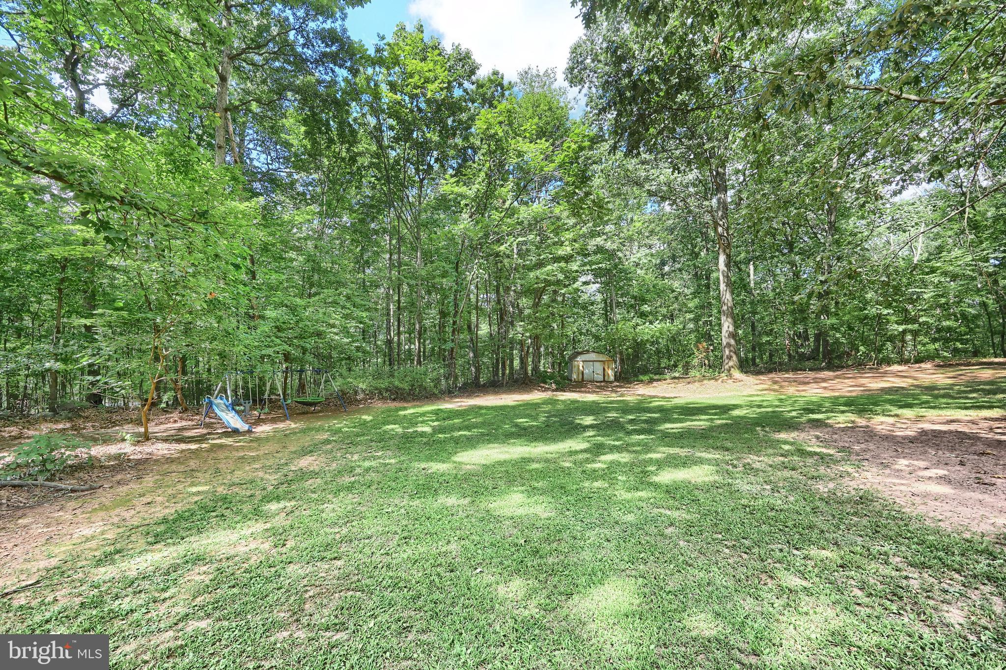 6031 Mountain Road Dover, PA 17315 - Photo 8 of 47 a view of outdoor space with trees all around