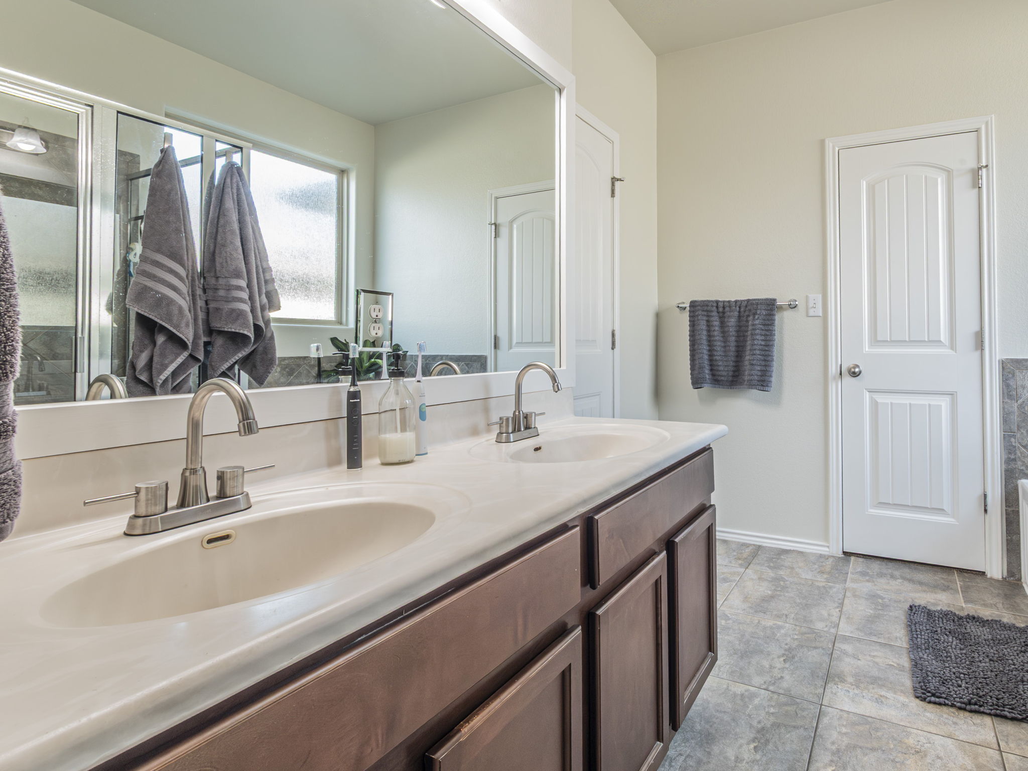 1366 Heep Run Buda, TX 78610 - Photo 13 of 37 Owner Suite Bathroom featuring double vanity.