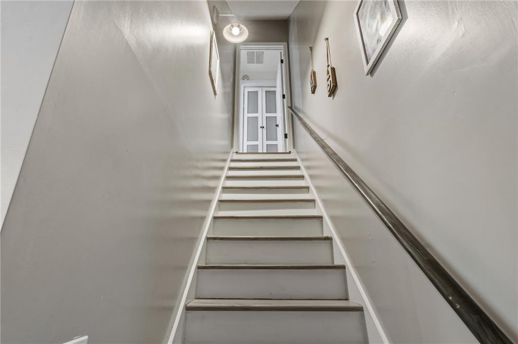 2700 Jack Glass Road Monroe, GA 30656 - Photo 29 of 48 a view of staircase with white walls and windows