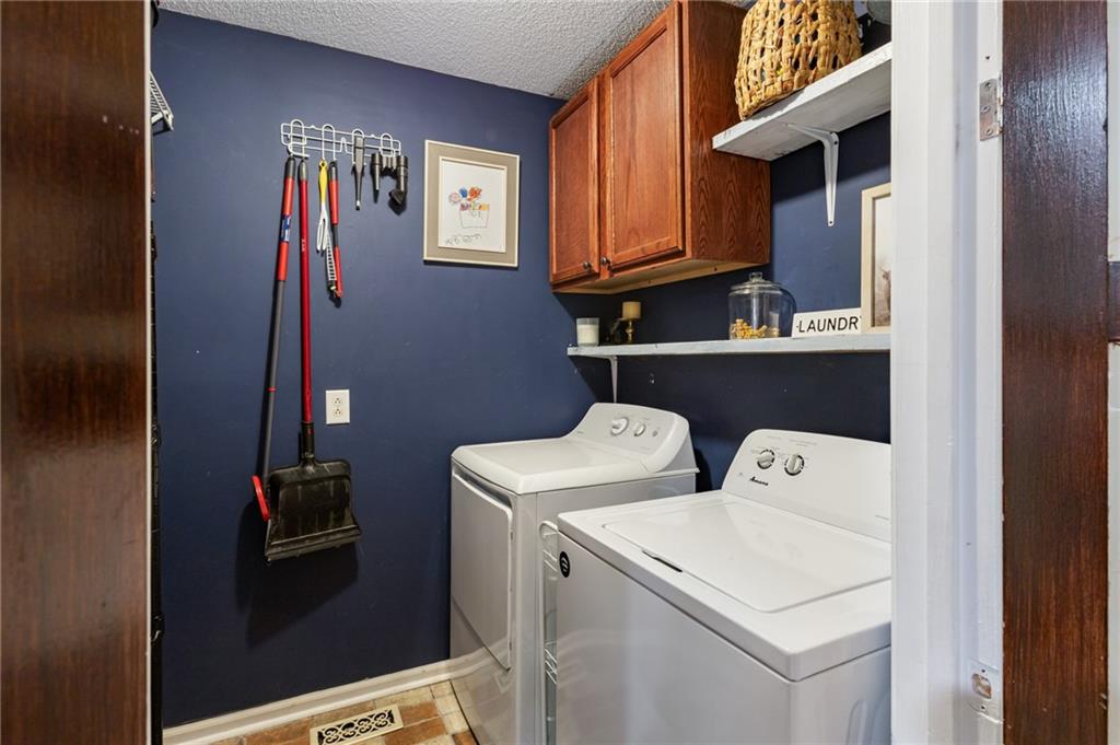 2700 Jack Glass Road Monroe, GA 30656 - Photo 36 of 48 a utility room with dryer and washer