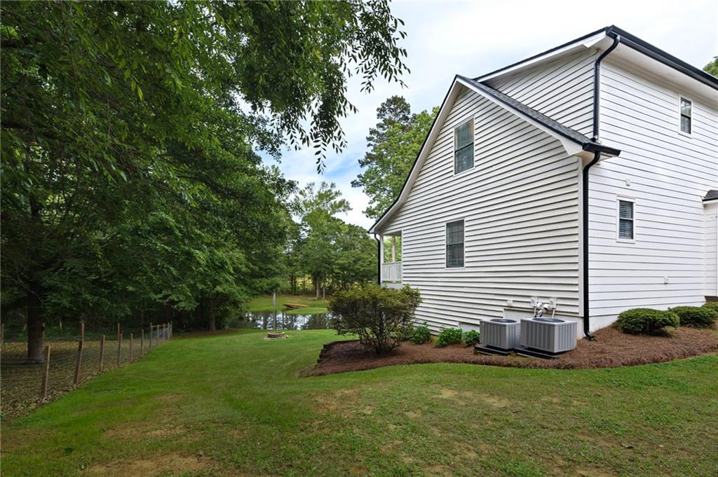 2700 Jack Glass Road Monroe, GA 30656 - Photo 43 of 48 a view of a house with a yard