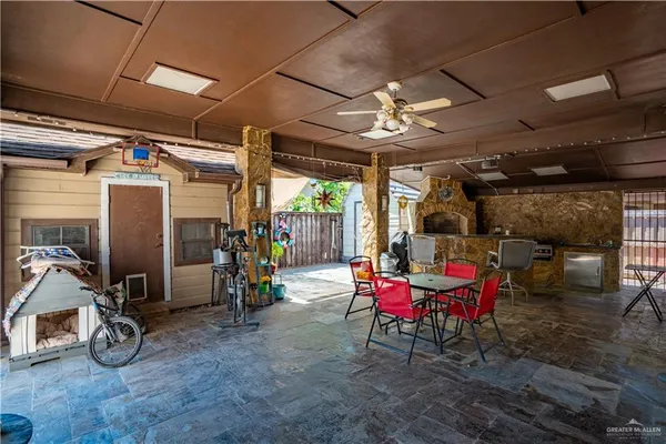 a view of a garage with a table and chairs