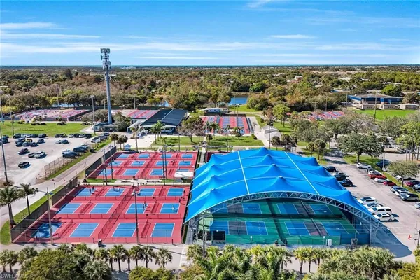 a view of a house with white walls