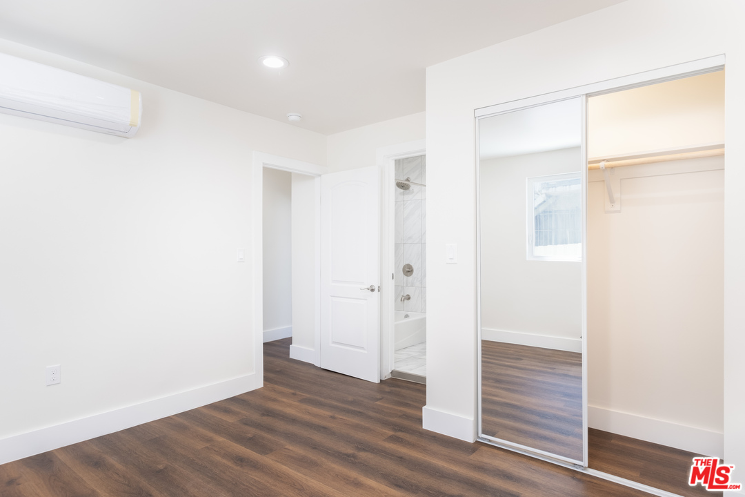 628 Silver Boulevard Los Angeles, CA 90026 - Photo 16 of 22 a view of empty room with wooden floor