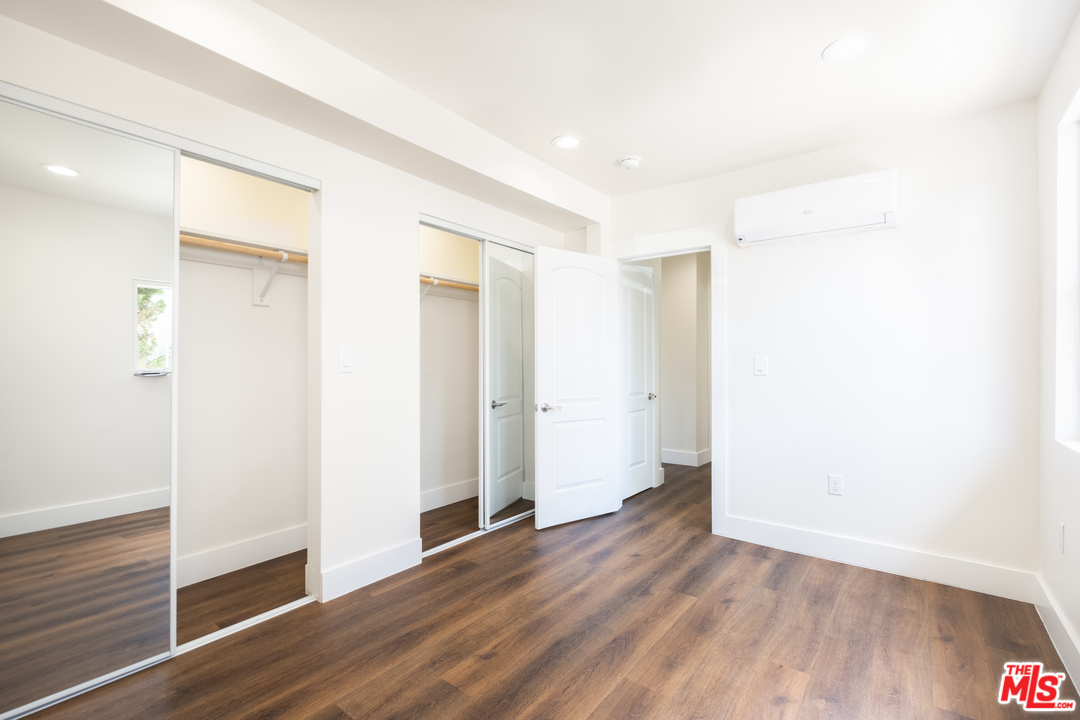 628 Silver Boulevard Los Angeles, CA 90026 - Photo 18 of 22 a view of empty room with wooden floor