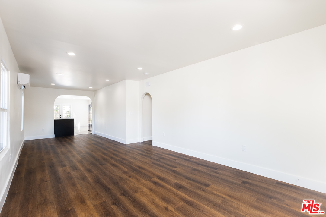 628 Silver Boulevard Los Angeles, CA 90026 - Photo 4 of 22 a view of an empty room with wooden floor