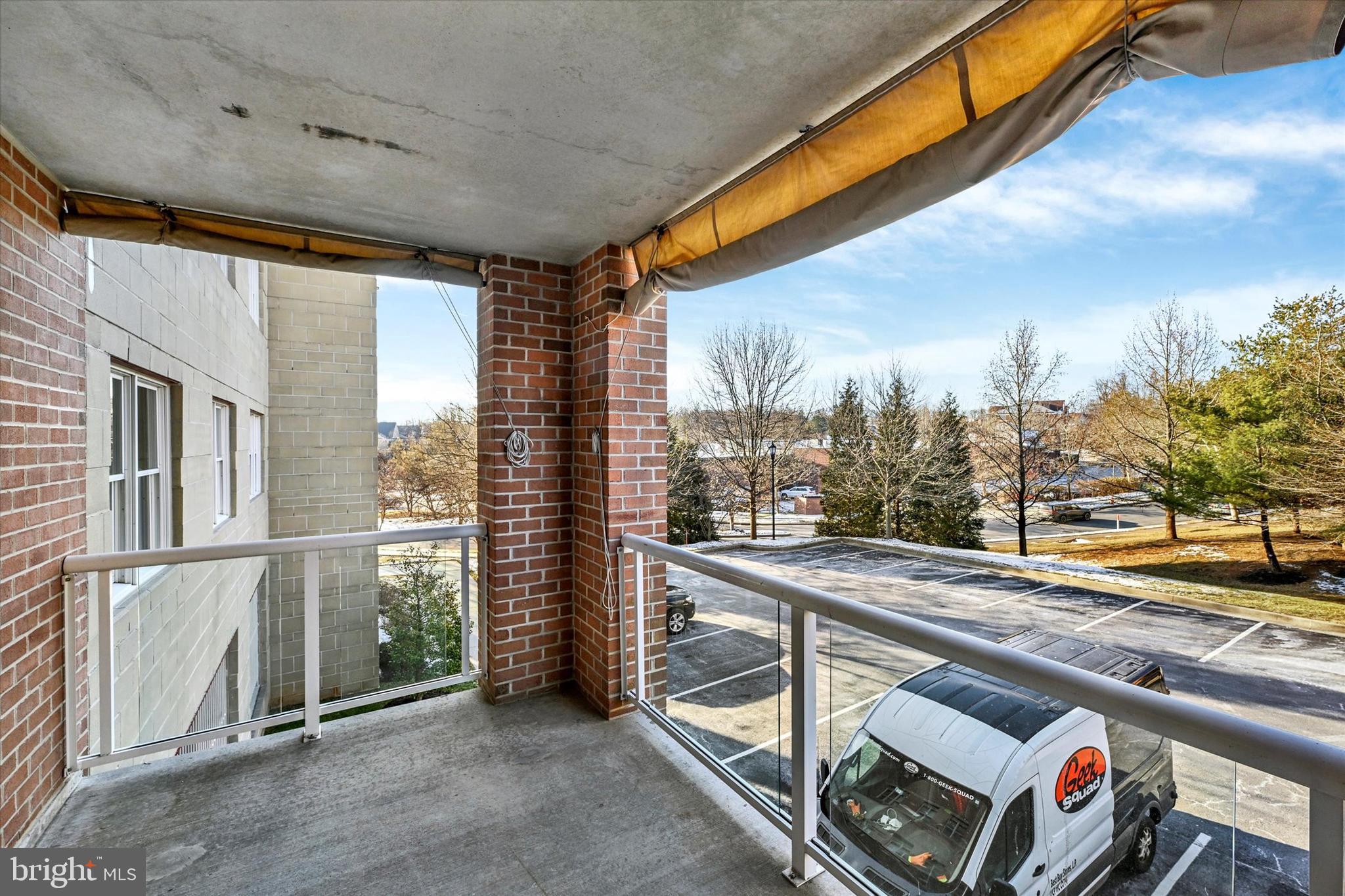 12236 Roundwood Road, Unit 104 Lutherville-Timonium, MD 21093 - Photo 25 of 27 a view of a balcony with city view