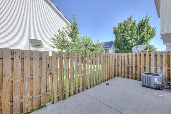 a view of a wooden fence