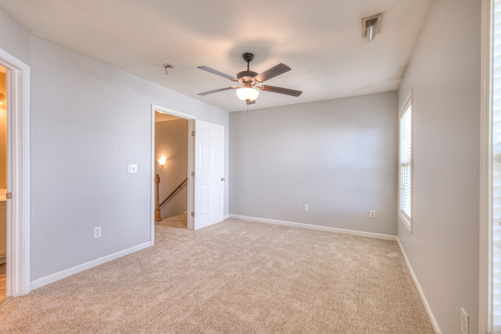 4027 Clinton Lane Spring Hill, TN 37174 - Photo 8 of 25 an empty room with closet and a ceiling fan