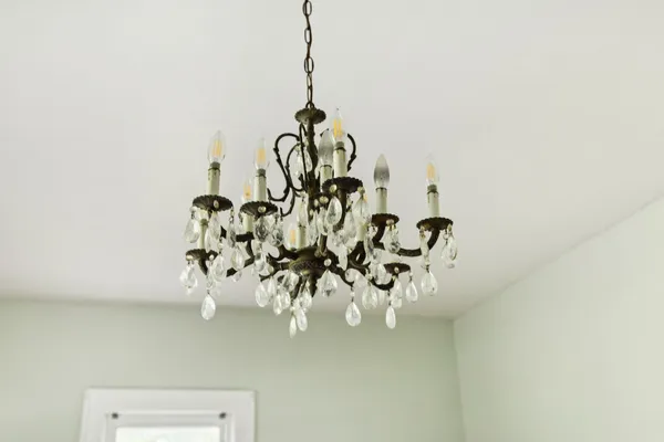 a white vase with white flowers