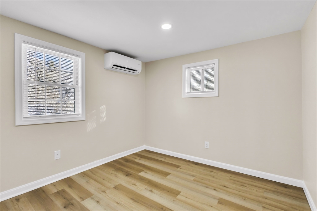 1 Columbia Road Billerica, MA 01821 - Photo 12 of 22 a view of a big room with wooden floor and windows