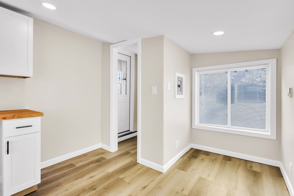 1 Columbia Road Billerica, MA 01821 - Photo 16 of 22 a view of a room with wooden floor and a window