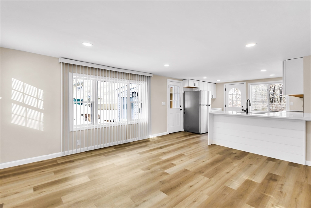 1 Columbia Road Billerica, MA 01821 - Photo 6 of 22 a view of an empty room with a window