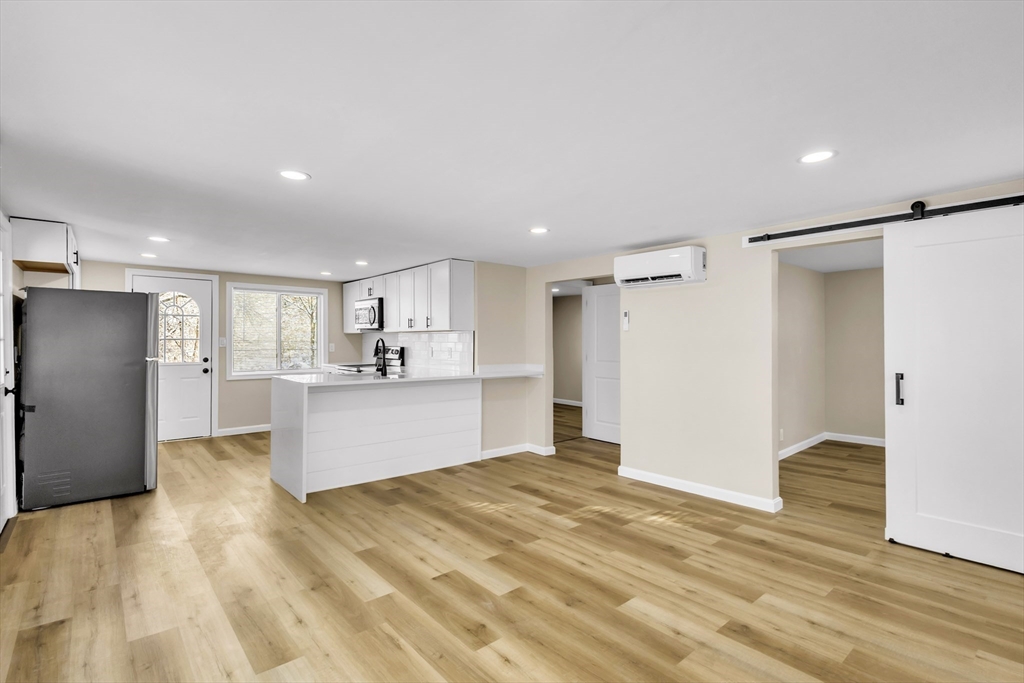 1 Columbia Road Billerica, MA 01821 - Photo 7 of 22 a large kitchen with a refrigerator and a sink