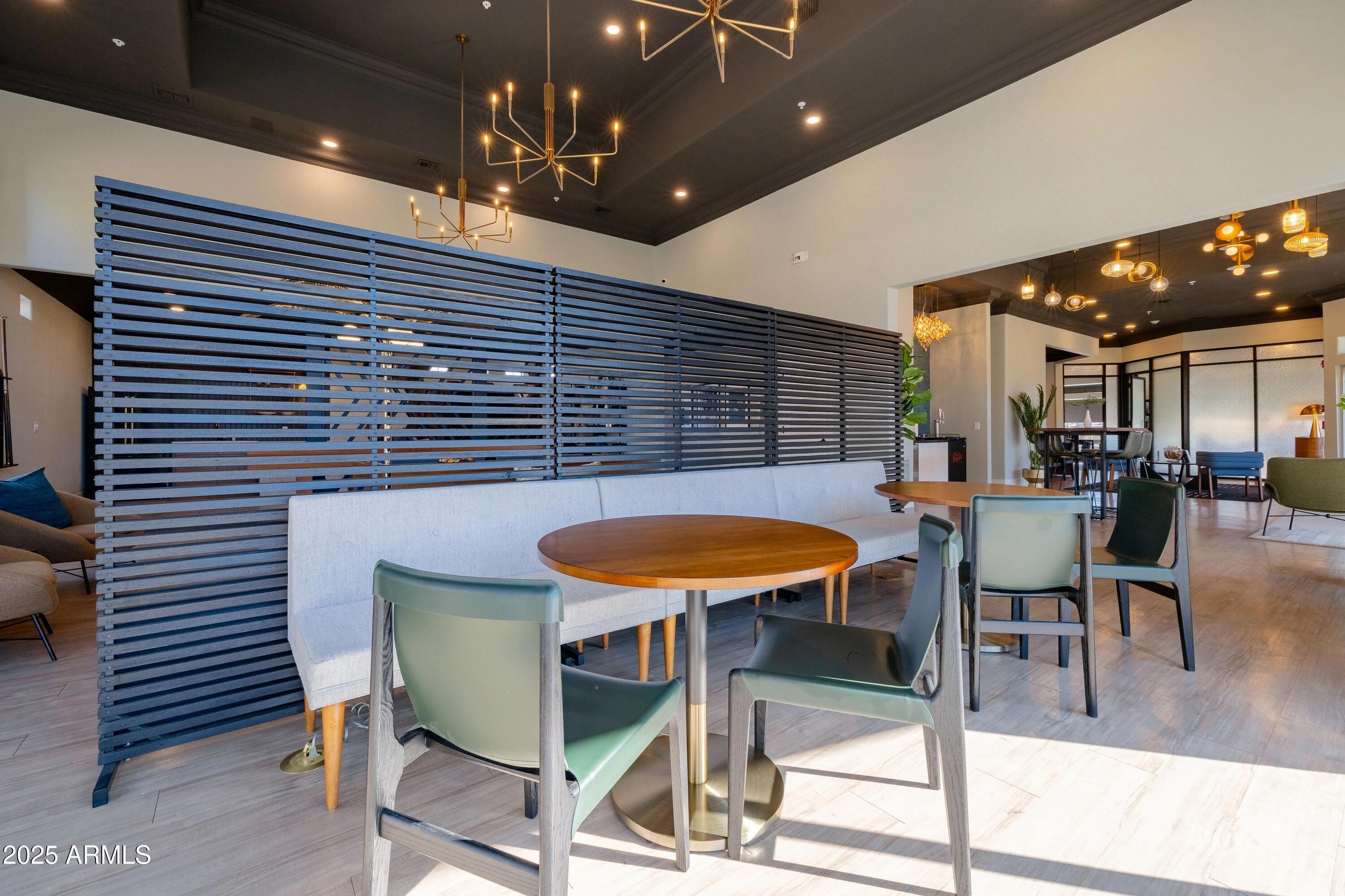 17374 North 89th Avenue, Unit C1 Peoria, AZ 85382 - Photo 17 of 22 a view of a chairs and table in a patio
