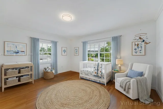 a spacious bedroom with a bed and a couch