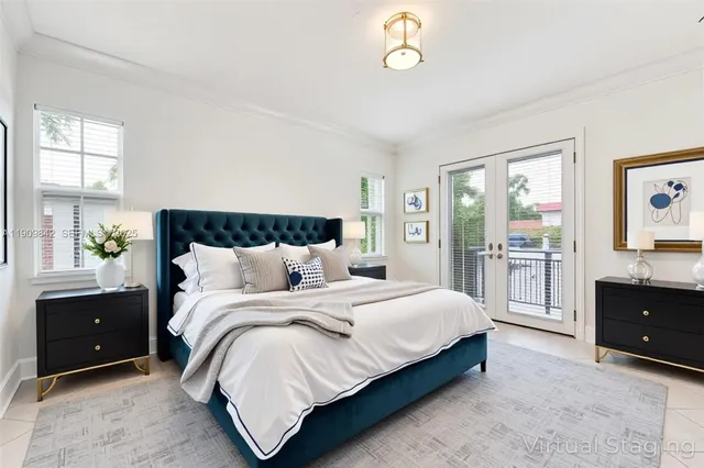 a swimming pool with outdoor seating and plants