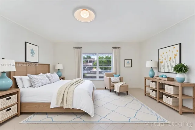 a bedroom with a bed furniture and window