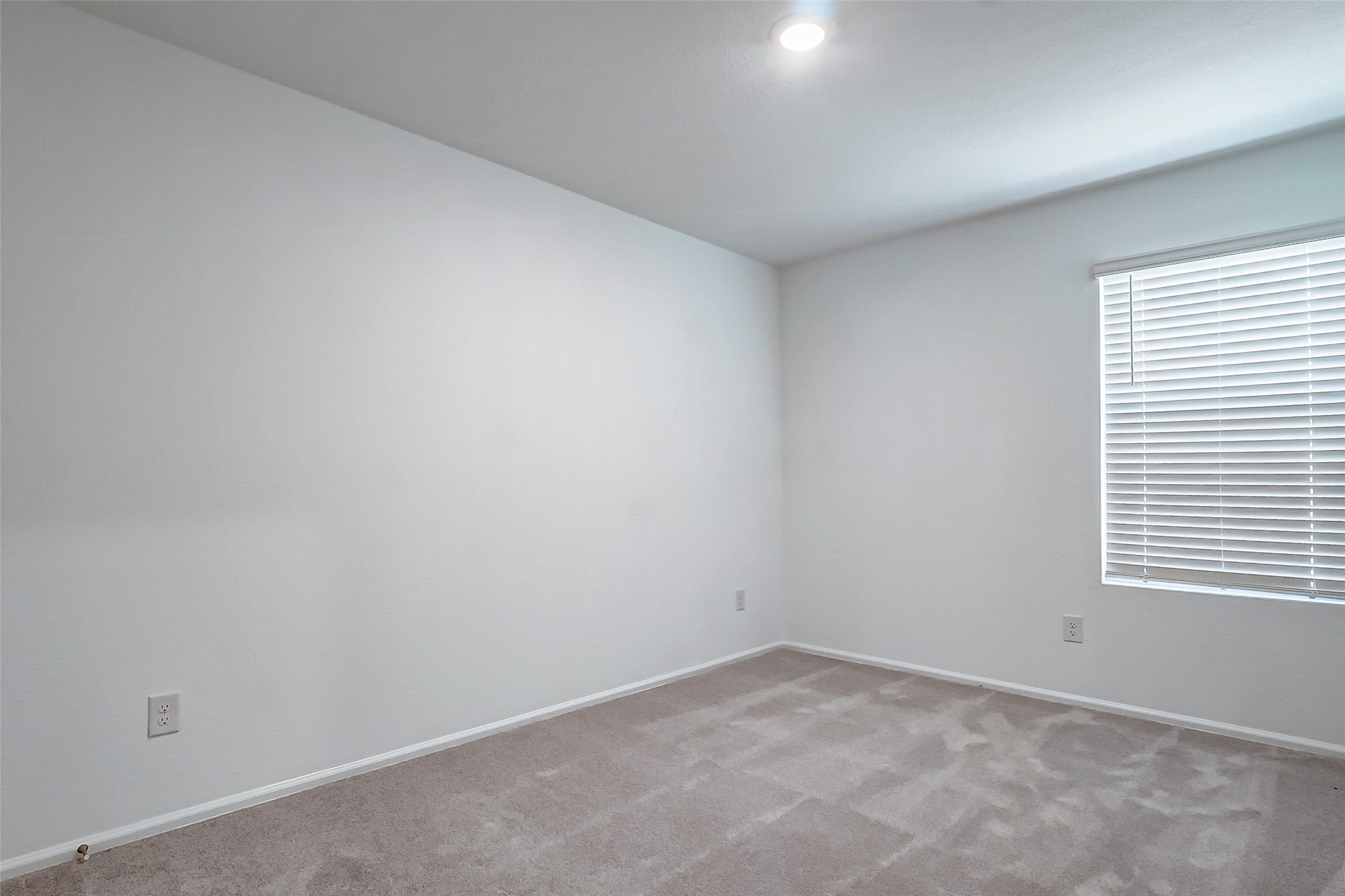 20961 Zuccala Drive New Caney, TX 77357 - Photo 20 of 33 an empty room with a window