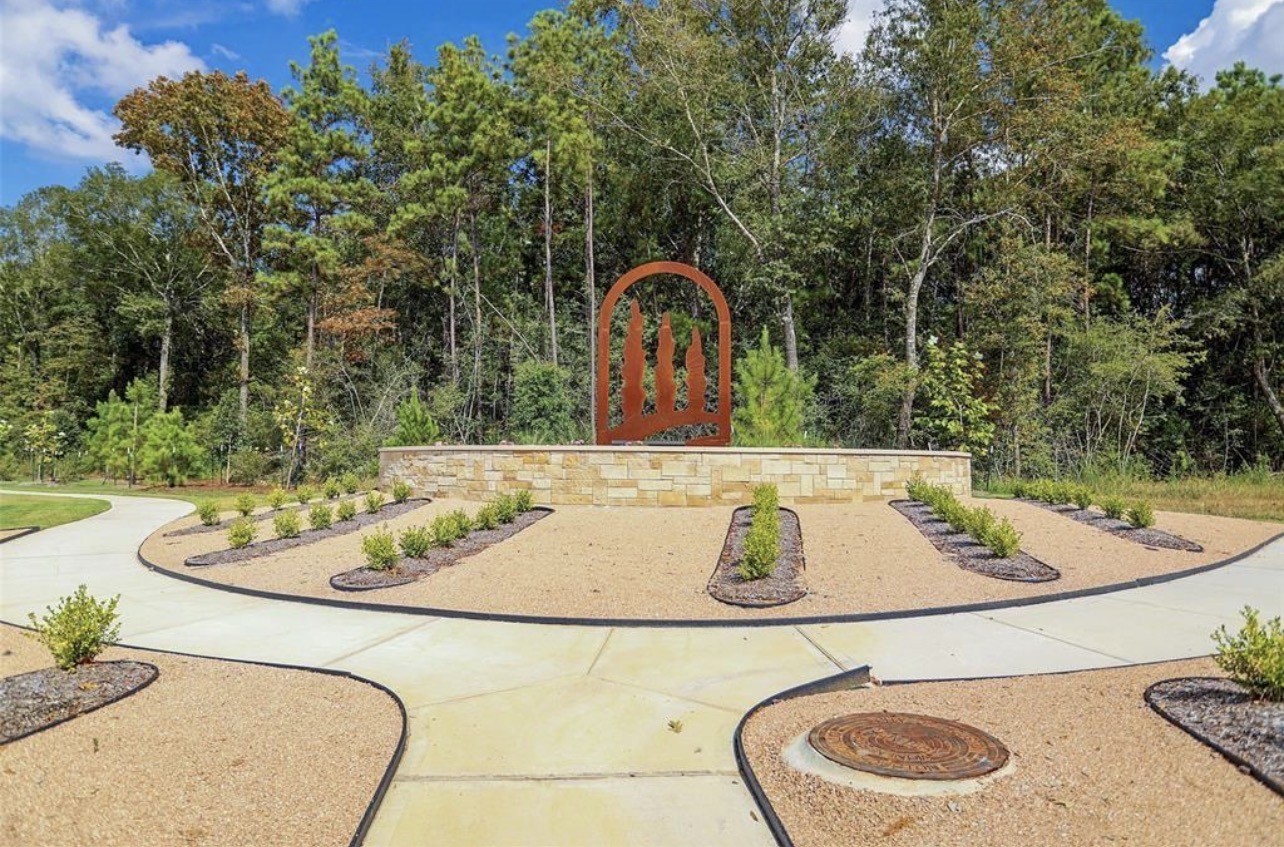 20961 Zuccala Drive New Caney, TX 77357 - Photo 31 of 33 a view of a dining table and chairs