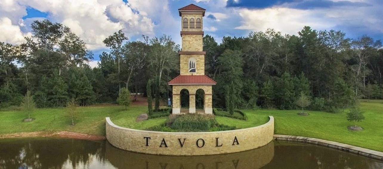 20961 Zuccala Drive New Caney, TX 77357 - Photo 32 of 33 a view of a white house with a yard potted plants and large trees