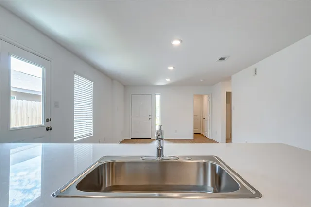 a close view of sink and mirror